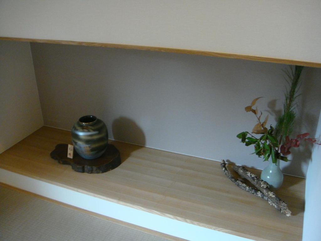Mizuhasou Hotell Hatsukaichi Rum bild